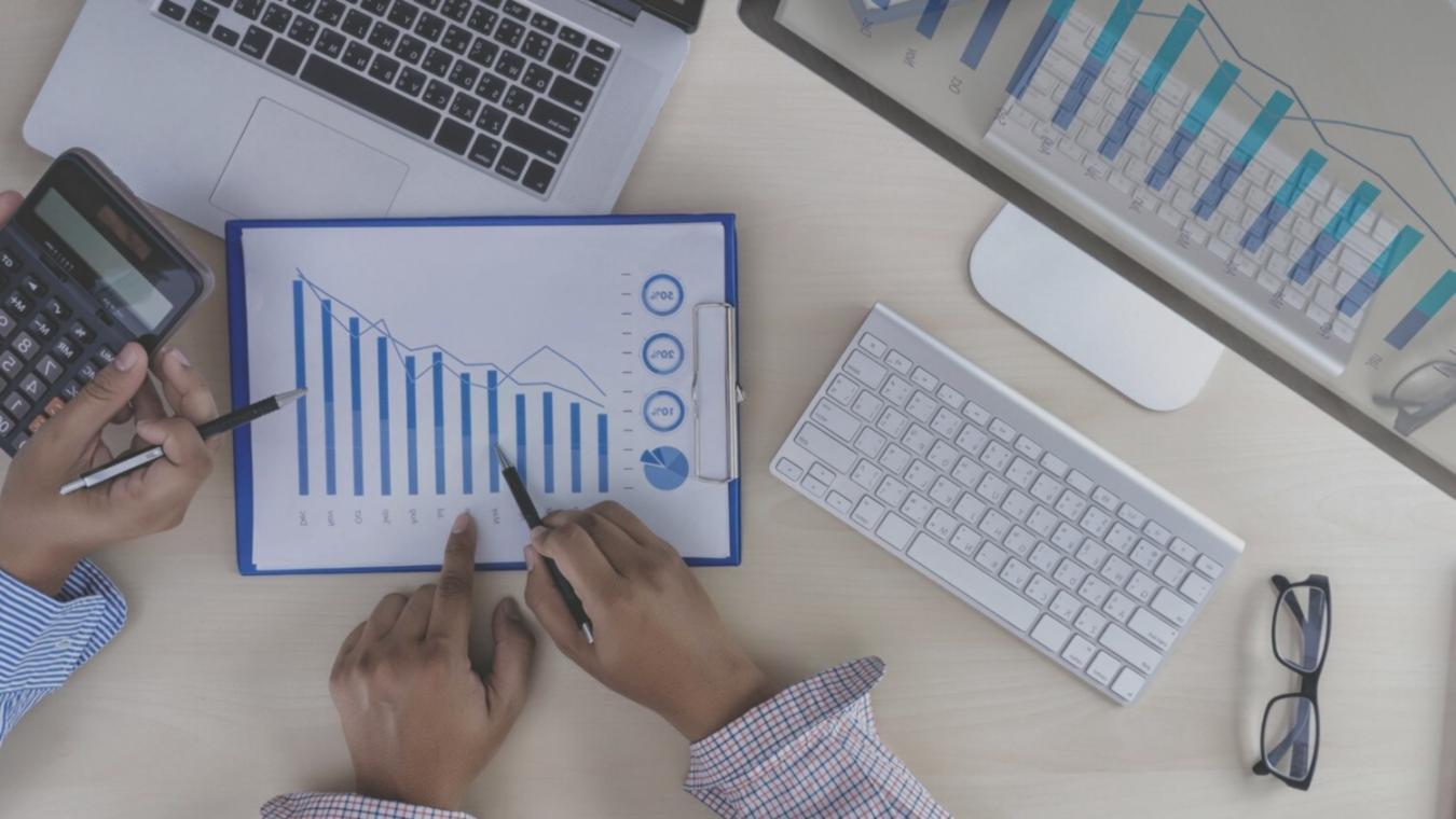 Workshop participants engaging with economic data visualization